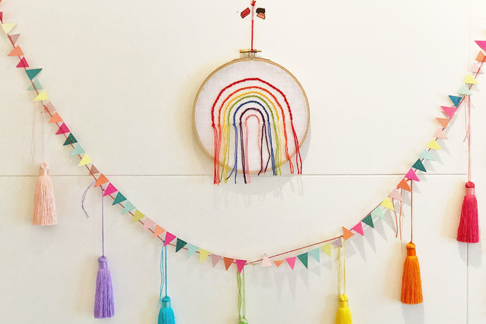 Spread joy! Embroidered Rainbow DIY for your door
