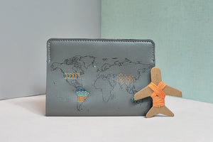 Grey stitch passport cover with patterns sewn